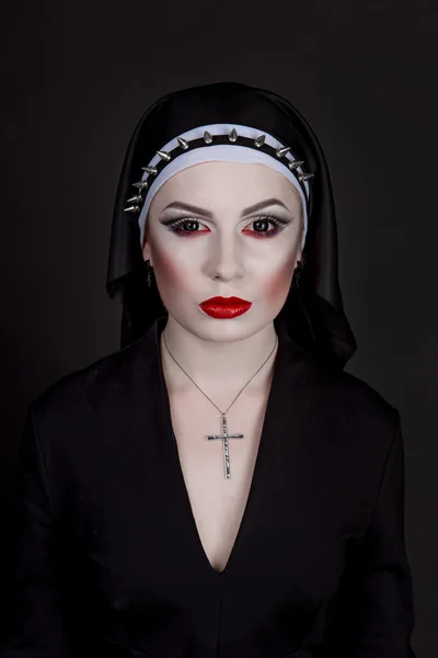 Halloween. Girl dressed in evil sexy nun — Stock Photo, Image