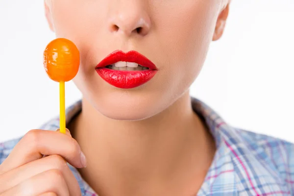 Closeup photo of a girl with a lollipop — Stock Photo, Image