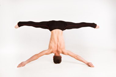 man stretch gymnastic balance posture isolated studio on white b clipart