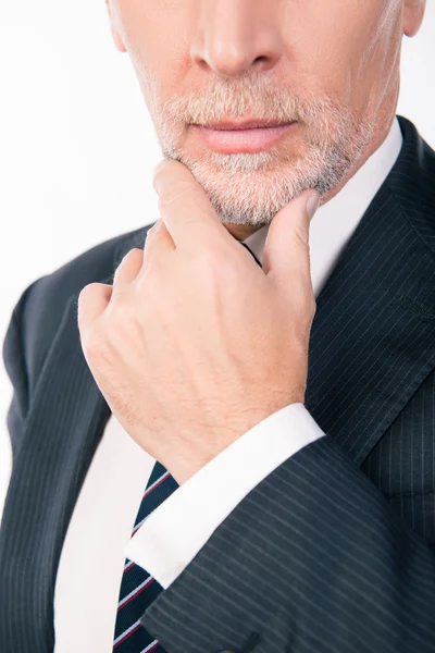 Homem de negócios inteligente com ponderações barba cinza colocando a mão — Fotografia de Stock