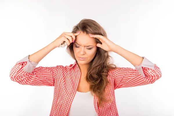 Tired young woman suffering from headache holding tablets — Stock Photo, Image