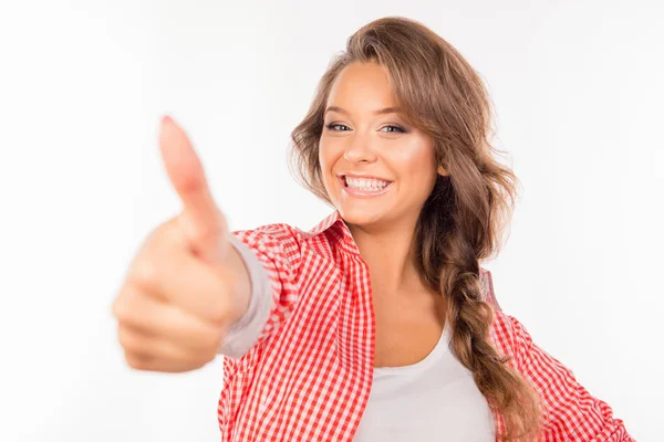 Feliz linda chica mostrando el pulgar hacia arriba y sonriendo — Foto de Stock