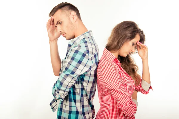 Couple standing back to back — Stock Photo, Image