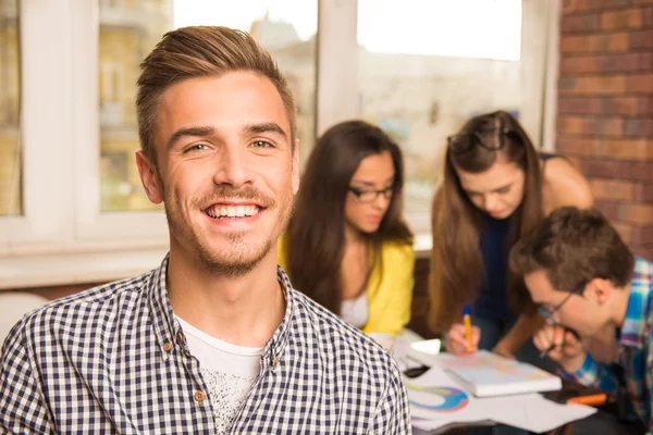 Successful young team investigating a business project — Stock Photo, Image