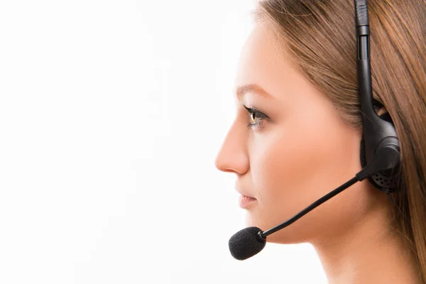 Een close-up kant-gezicht portret van een jonge agent van callcenter — Stockfoto