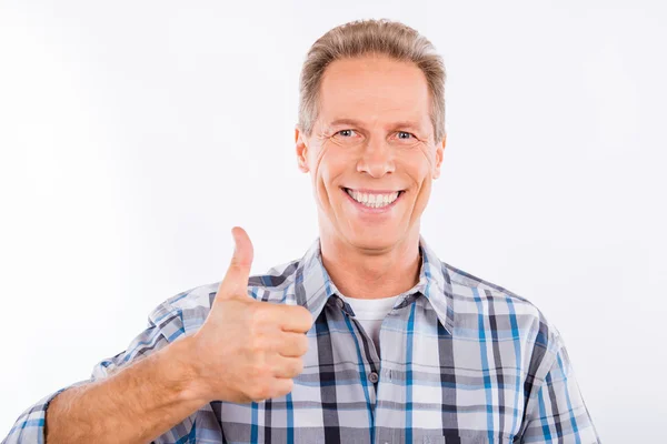 Handsome mature man showing gesture thumb up — Stock Photo, Image