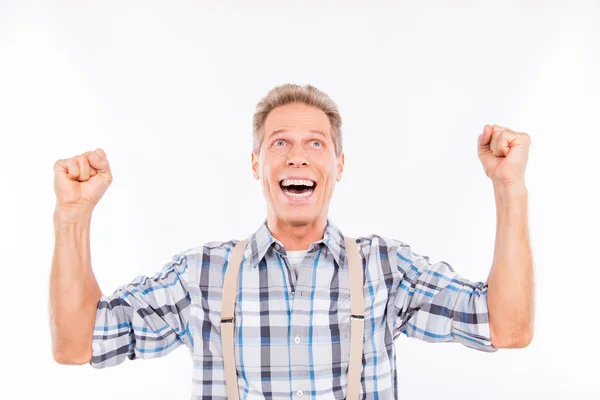 Handsome excited man put up his hands — Stock Photo, Image