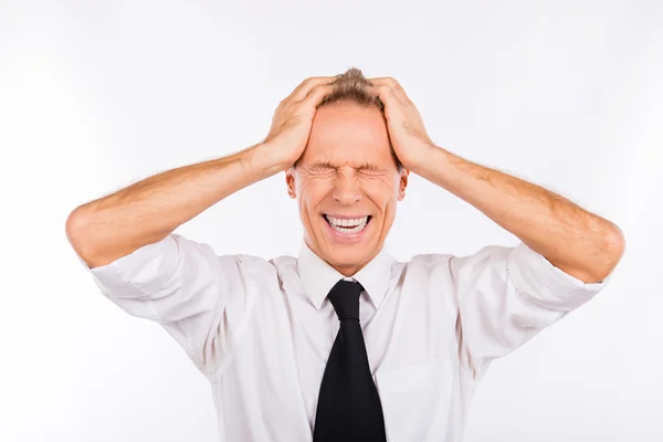 Handsome depressed businessman holding his head — Stock Photo, Image