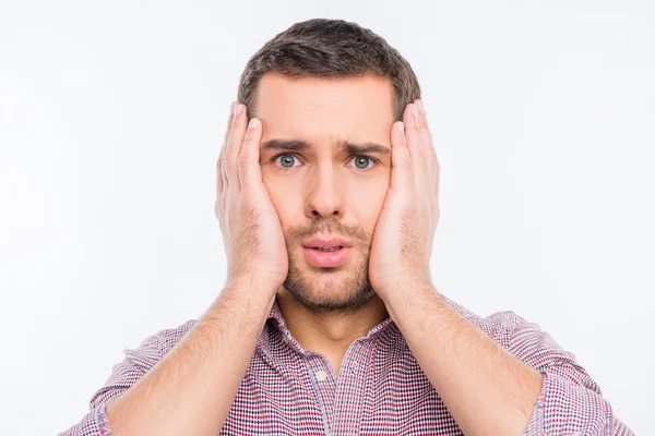 Concerned man touching his face — Stock Photo, Image