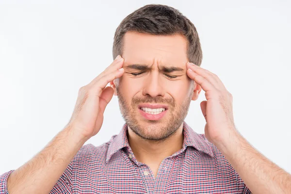 Homem atraente sofrendo de dor de cabeça — Fotografia de Stock