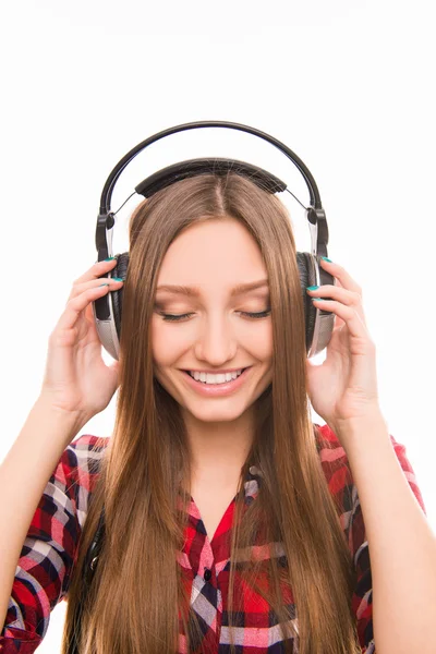 Calm relaxed young woman with headphones Royalty Free Stock Photos