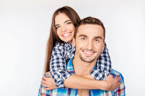 Pretty young woman embracing her boyfriend — Stock Photo, Image