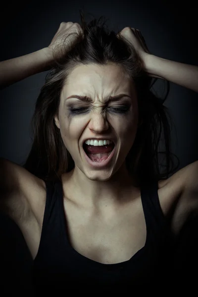 Close up portrait of a scared screaming girl, hands on the foreh — Stock Photo, Image