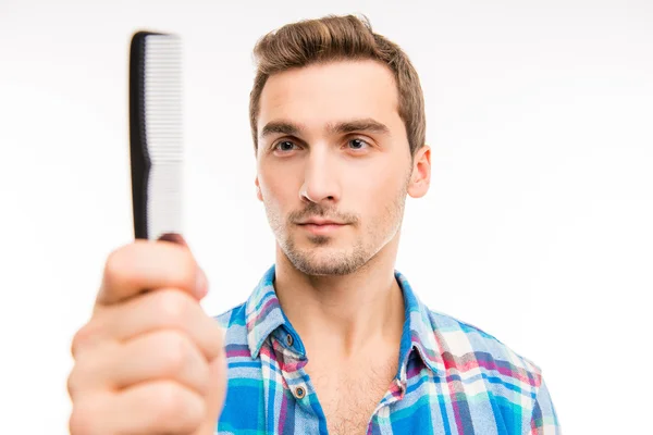 Portrait of a n interested handsome man on the white background — Stock Photo, Image