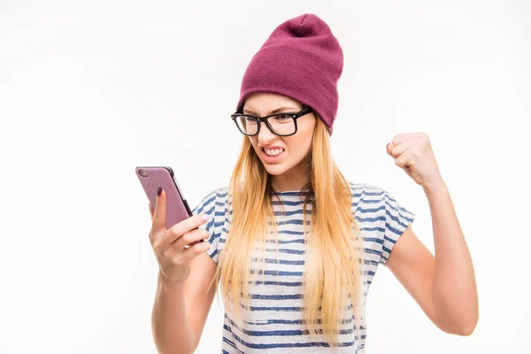 Angry frustrated young woman with phone — Stock Photo, Image