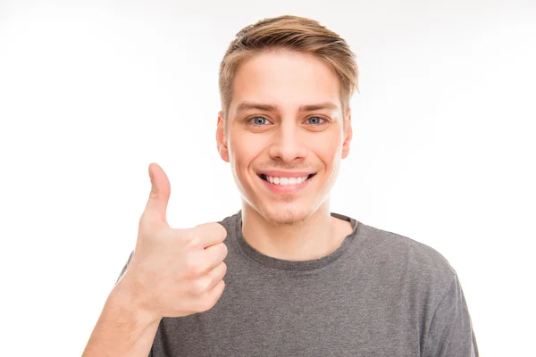 Pretty cheerful young man in gray T-shirt gesturing "LIKE" — Stock Photo, Image