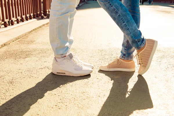 Closeup photo of couple in love on the bridge standing together — Stock Photo, Image