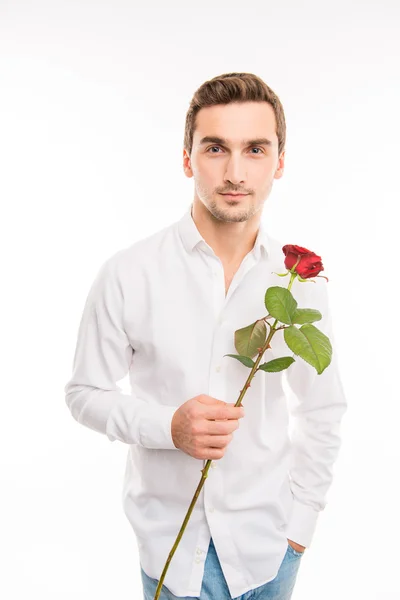 Portrait of handsome cute sexy boy with red rose — Stock Photo, Image