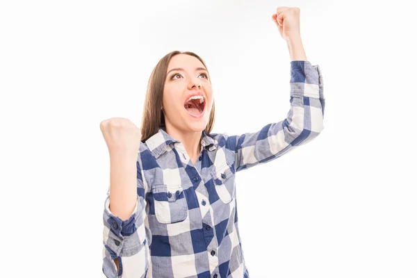 Cheerful happy girl celebrating her victory with raised hands Stock Image