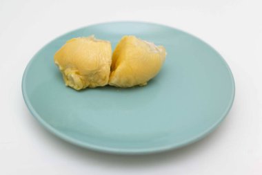 two sections of durians. The king of fruits in the Asian country