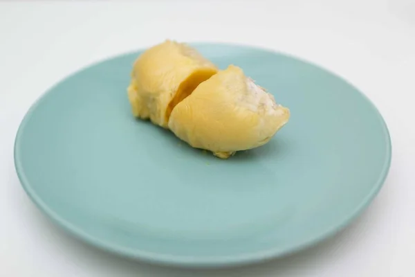 two sections of durians. The king of fruits in the Asian country