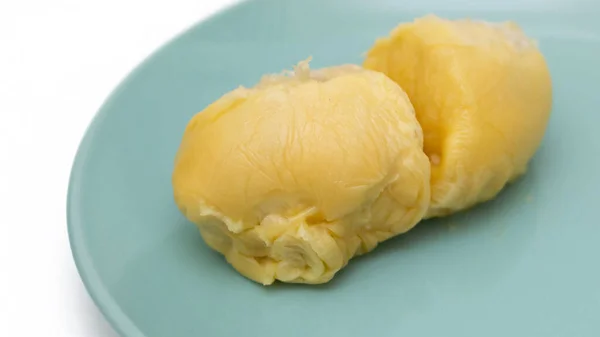 two sections of durians. The king of fruits in the Asian country