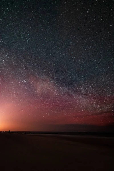 night sky by the sea with the milky way visible