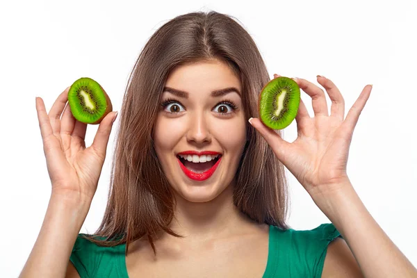 Girl holding kiwi. — Stock Photo, Image