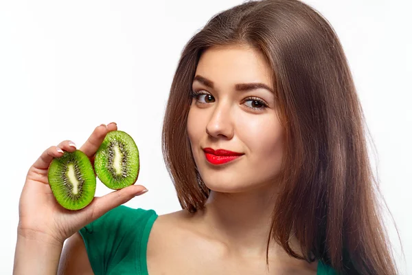 Girl holding kiwi. — Stock Photo, Image