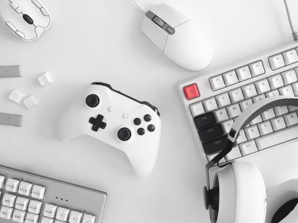 gamer work space concept, top view a gaming gear, mouse, keyboard, joystick and headset.