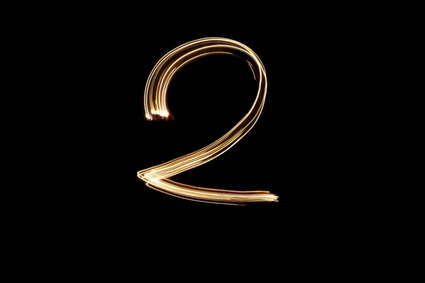 Number Long Exposure Photo Gold Lights Light Painting Number Two — Stock Photo, Image