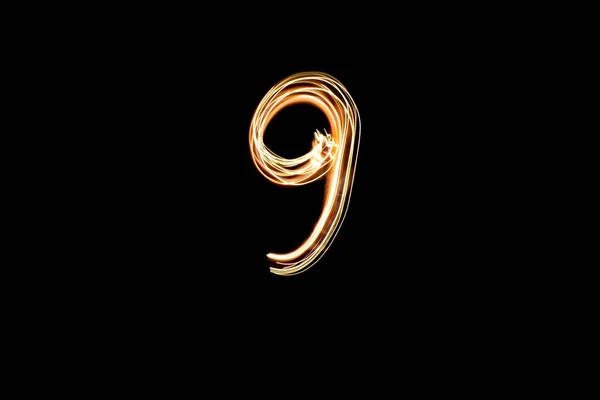 Nummer Langzeitbelichtungsfoto Von Goldlichtern Lichtmalerei Nummer Neun Auf Schwarzem Hintergrund — Stockfoto