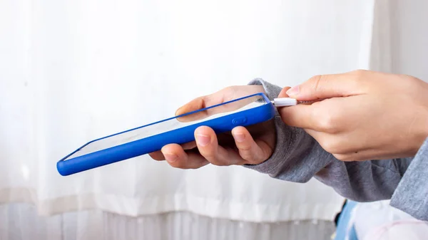 Woman Plugging Her Smartphone Charger — Stock Photo, Image