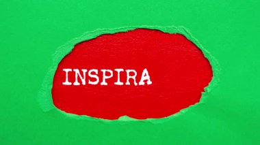 Inspiration message written on ripped torn paper background. Conceptual Inspiration symbol.