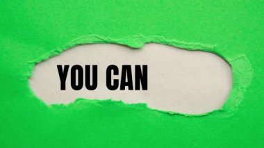 You Can Do It message written on ripped torn paper background. Conceptual You Can Do It symbol.