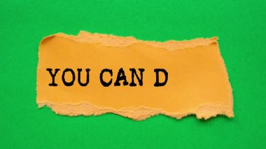 You Can Do It message written on ripped torn paper background. Conceptual You Can Do It symbol.