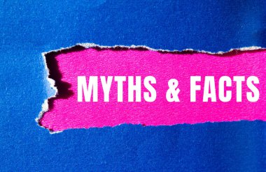Myths and facts message written on ripped torn paper background. Conceptual Myths and facts symbol. Copy space.