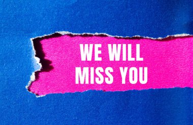 We will miss you message written on ripped torn paper background. Conceptual We will miss you symbol. Copy space.