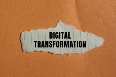 Digital Transformation message written on ripped torn paper background. Conceptual Digital Transformation symbol. Copy space.