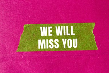 We will miss you message written on ripped torn paper background. Conceptual We will miss you symbol. Copy space.