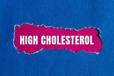 High cholesterol message written on ripped torn paper background. Conceptual High cholesterol symbol. Copy space.