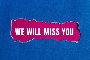 We will miss you message written on ripped torn paper background. Conceptual We will miss you symbol. Copy space.