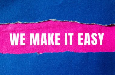 We make it easy message written on ripped torn paper background. Conceptual We make it easy symbol. Copy space.