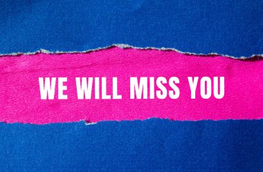 We will miss you message written on ripped torn paper background. Conceptual We will miss you symbol. Copy space.