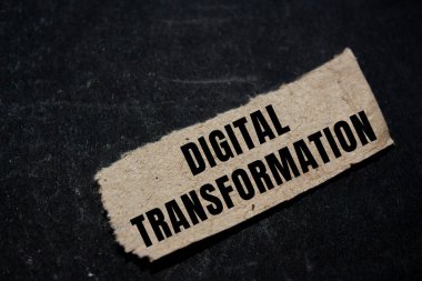 Digital Transformation message written on ripped torn paper background. Conceptual Digital Transformation symbol. Copy space.