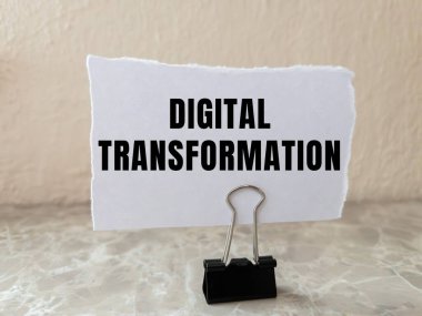 Digital Transformation message written on ripped torn paper background. Conceptual Digital Transformation symbol. Copy space.