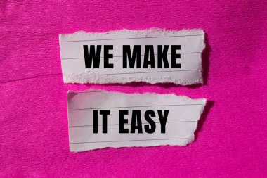 We make it easy message written on ripped torn paper background. Conceptual We make it easy symbol. Copy space.