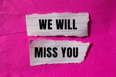 We will miss you message written on ripped torn paper background. Conceptual We will miss you symbol. Copy space.