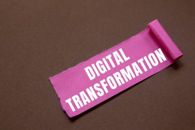 Digital Transformation message written on ripped torn paper background. Conceptual Digital Transformation symbol. Copy space.