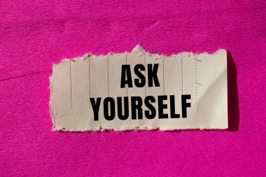 Ask yourself message written on ripped torn paper background. Conceptual Ask yourself symbol. Copy space.